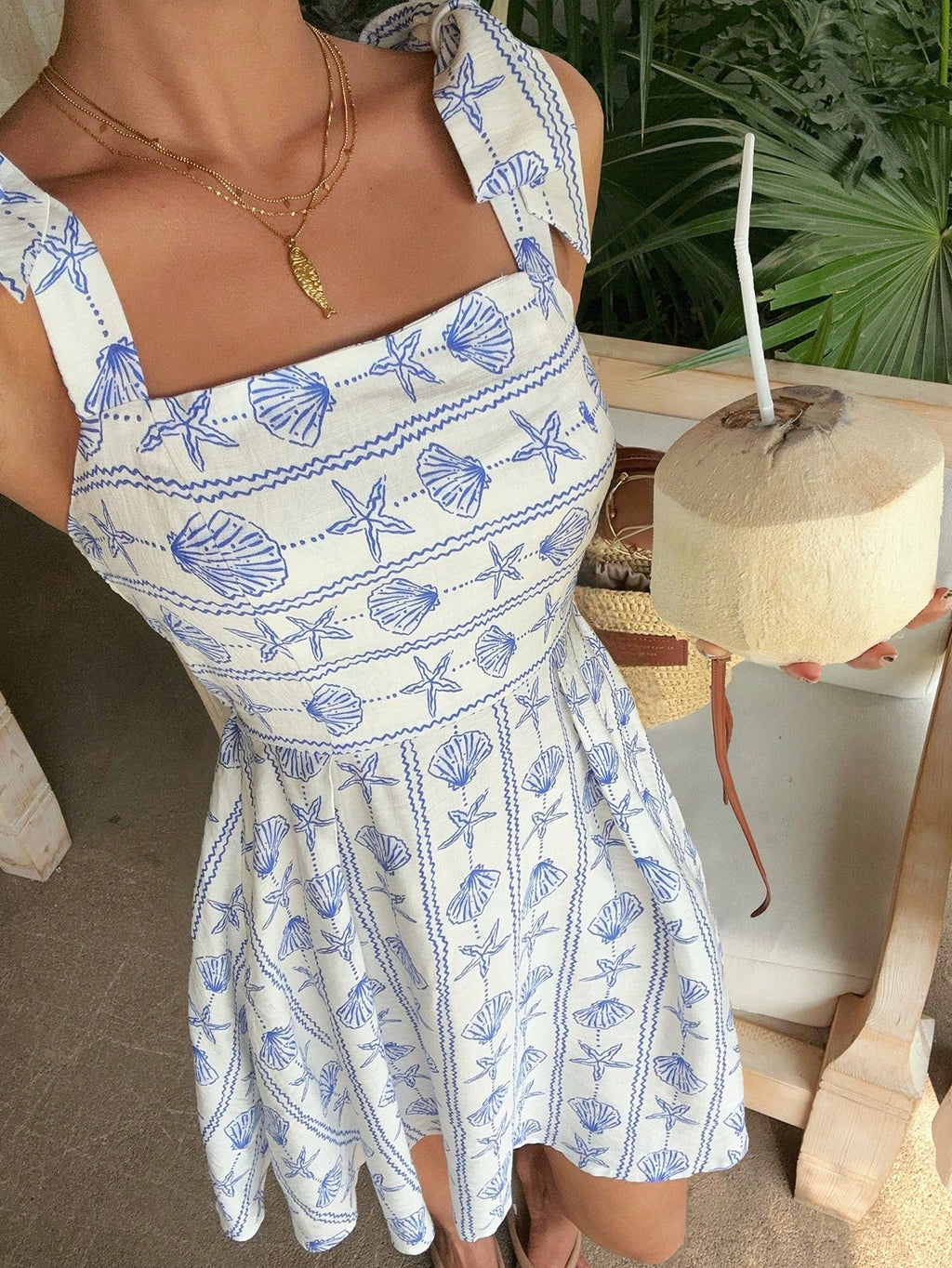 EZwear White And Blue Seashell Starfish Print Dress On Background,