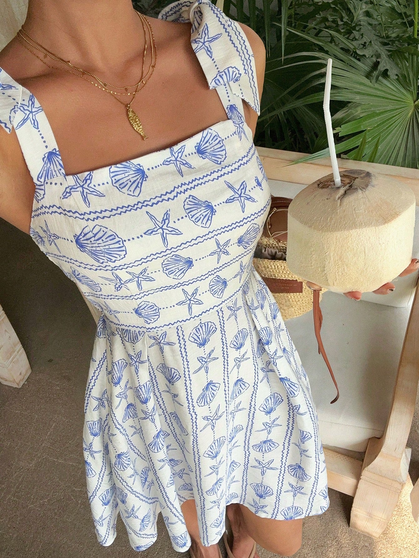 EZwear White And Blue Seashell Starfish Print Dress On Background,